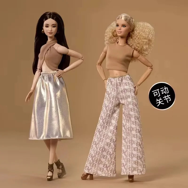 Barbie Basic Elegance Sammlerpuppe – Elegantes Design mit Goldakzenten