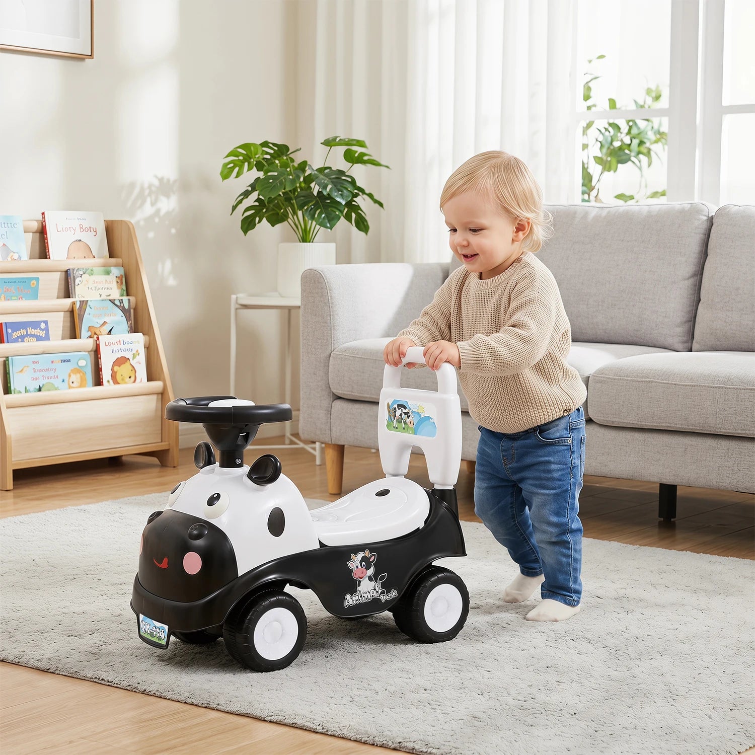 Kinderroller in Kuh-Design mit Staufach