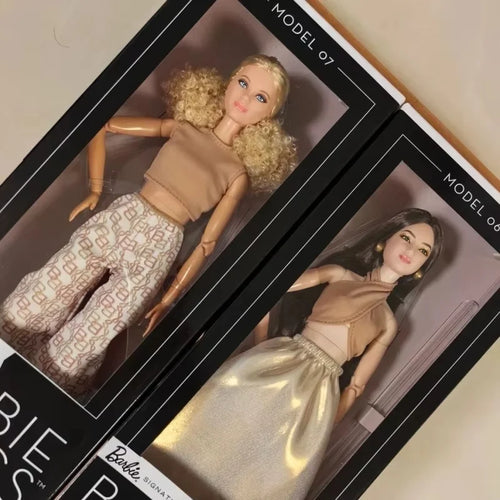 Barbie Basic Elegance Sammlerpuppe – Elegantes Design mit Goldakzenten